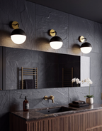 Atelierée Gatsby Globe Wall Sconce Set | Luxury Matt Black & Brushed Brass Bathroom Wall Lights