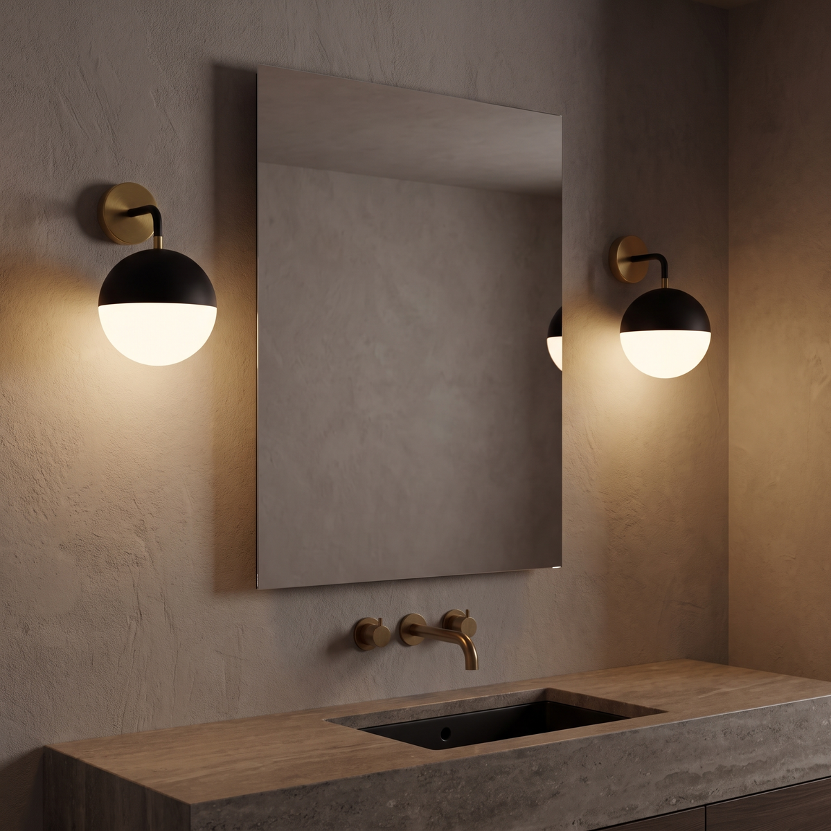 Atelierée Gatsby globe wall sconces mounted as a pair either side of a bathroom mirror