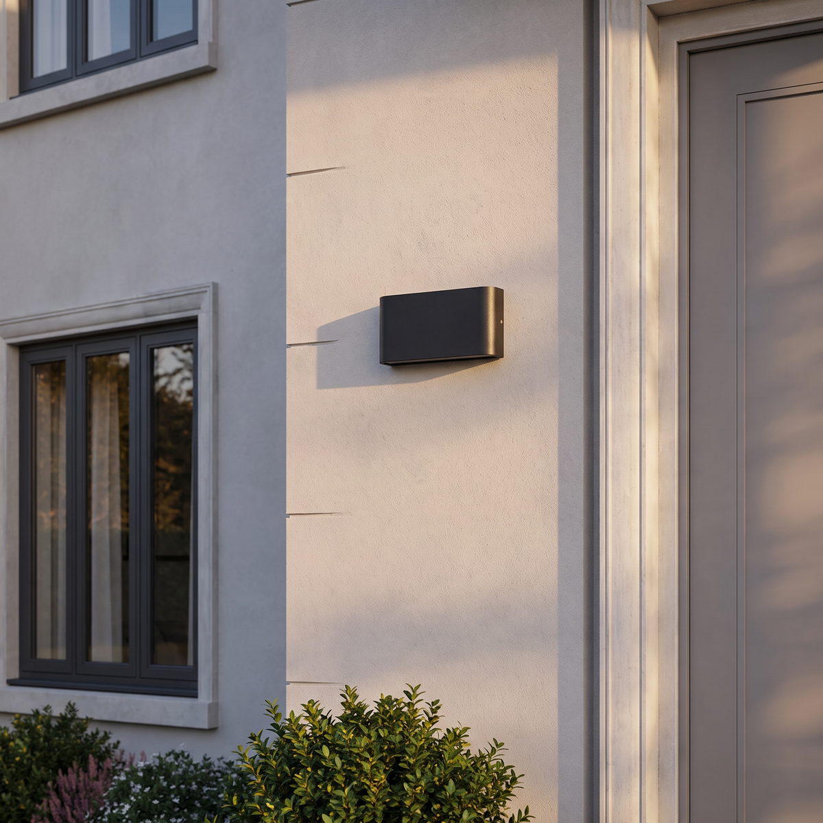 Atelierée slim LED exterior light mounted beside a doorway