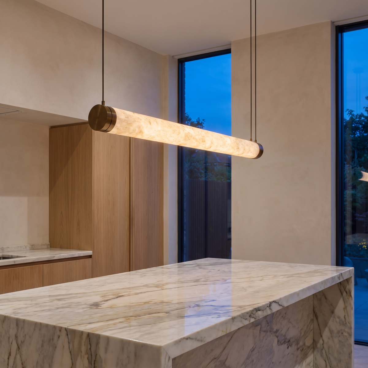 Atelierée Cascata alabaster ceiling light above a dining table