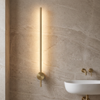 Atelierée Lacerva brushed brass LED wall light, IP44 rated