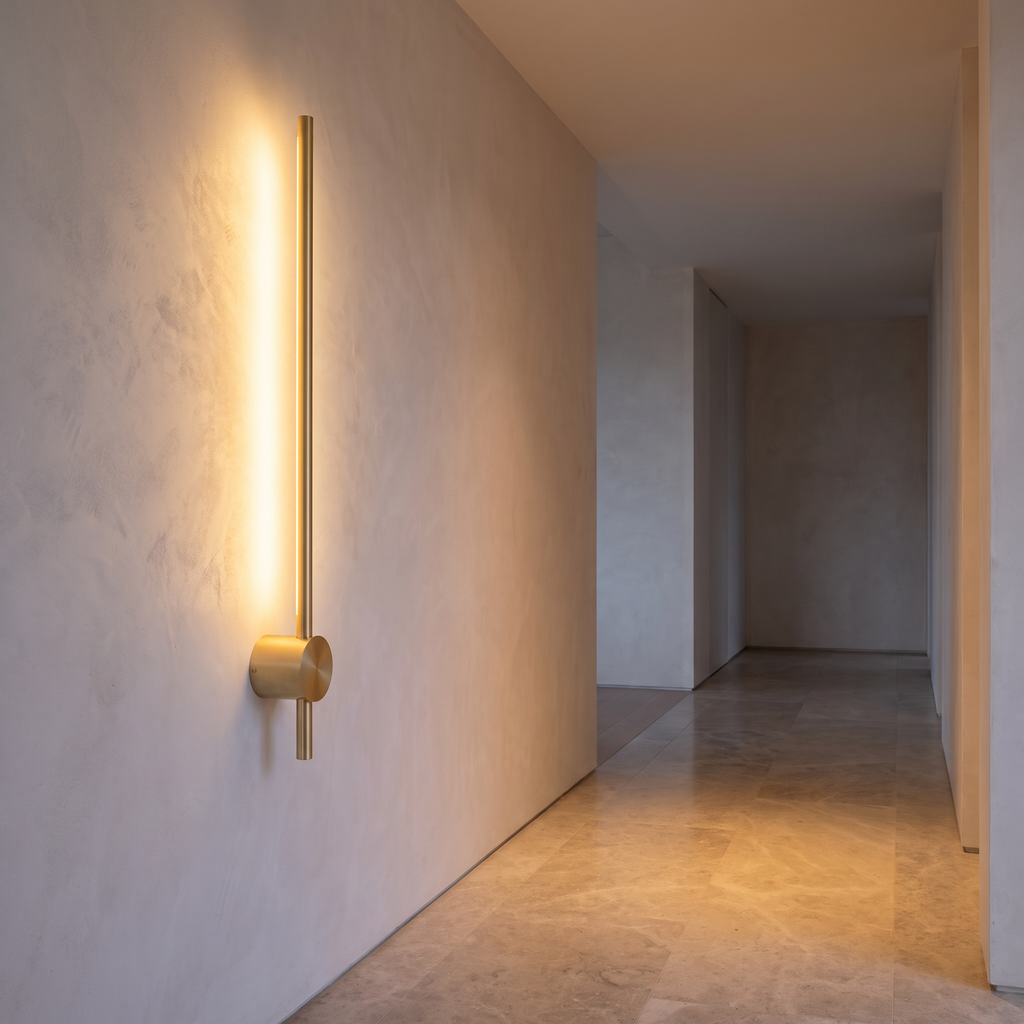 Atelierée brushed brass pillar wall light, adjustable 45 degree beam
