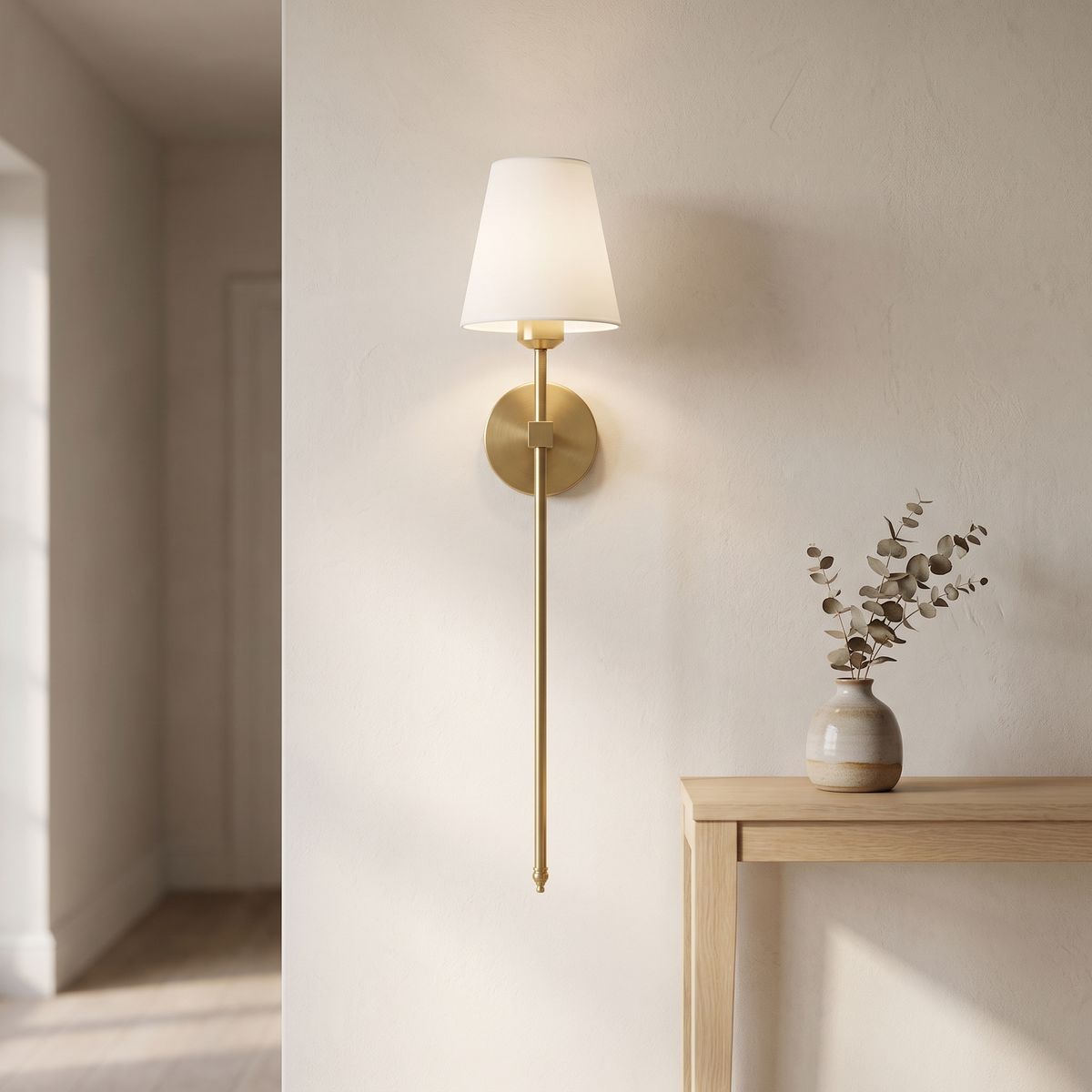 Atelierée Halston rechargeable brass wall light in a hallway