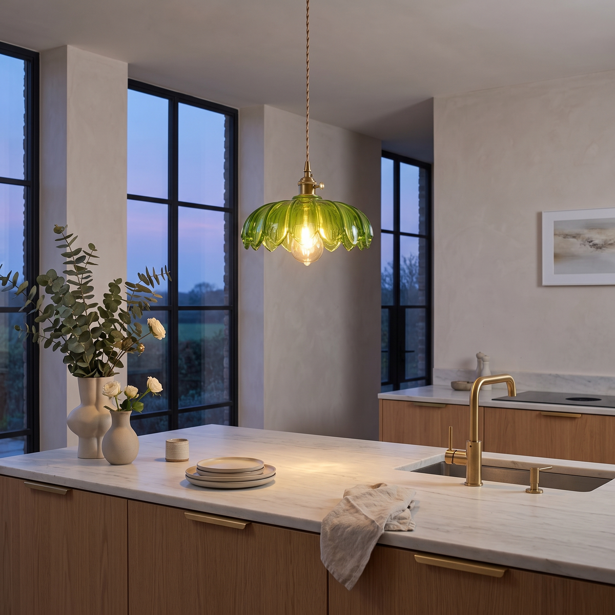 Vintage coloured glass flower pendant lamp above a kitchen island