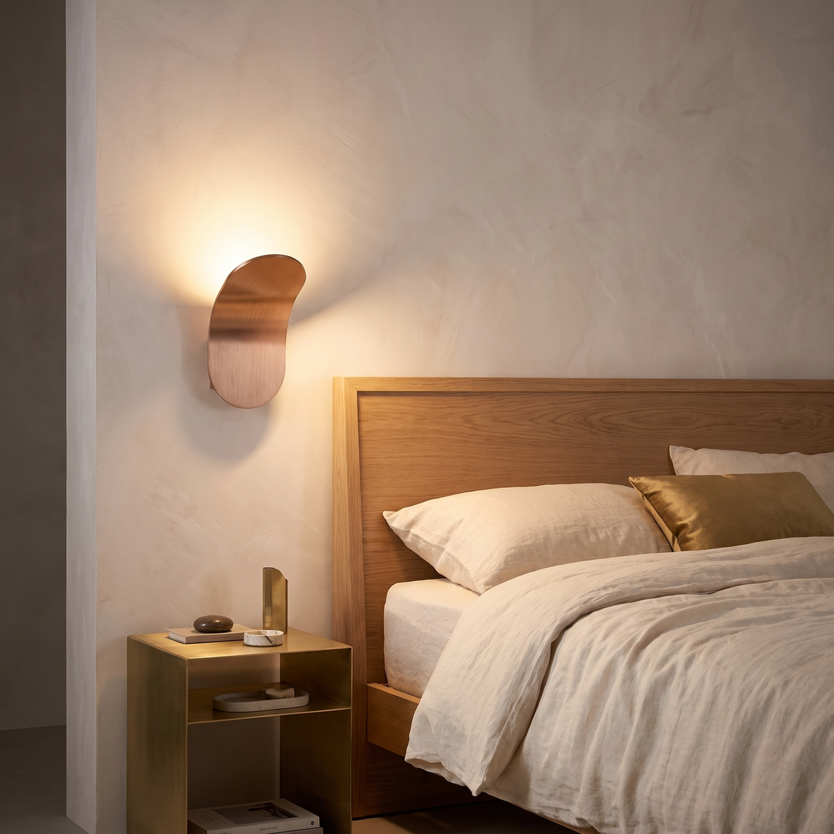 Minimalist LED wall lamp lit beside a bed