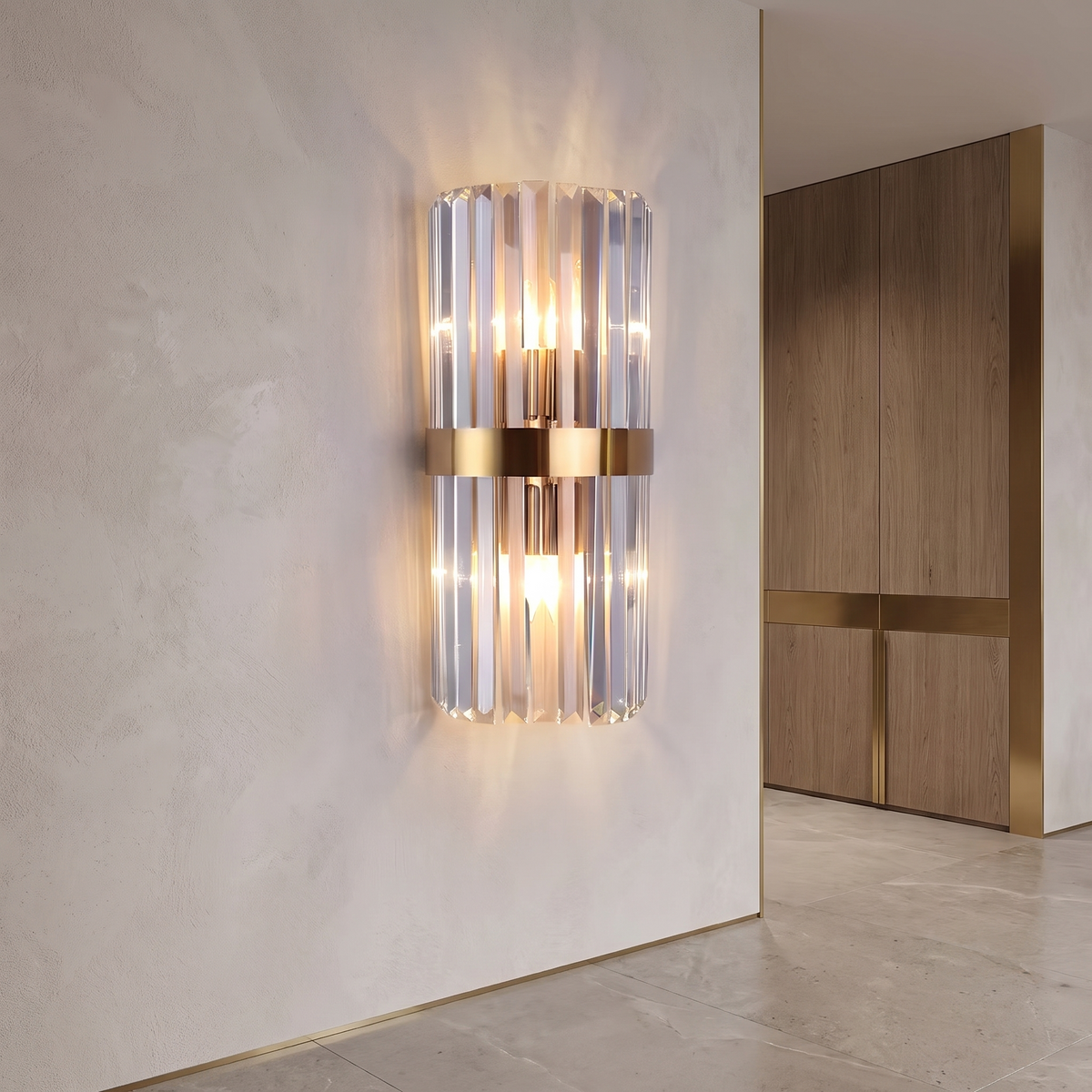 Crystal stainless steel wall sconce lit in a hallway