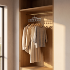 Rotating multi hook clothes hanger in an open oak wardrobe