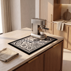 Absorbent retro coffee mat on a stone worktop beneath a brushed steel coffee machine