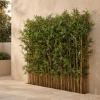 Artificial bamboo screening fixed to a rendered garden wall on a terrace