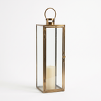70cm brass and glass floor standing candle lantern on a white background