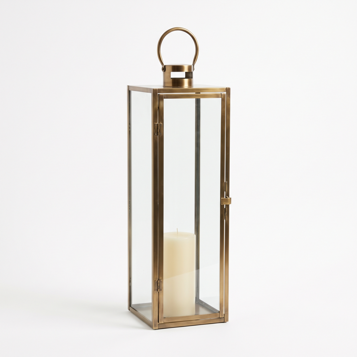 70cm brass and glass floor standing candle lantern on a white background