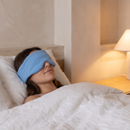 Atelierée weighted sleep mask being worn in bed