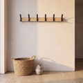 Nordic wall mounted coat rack fitted on a hallway wall