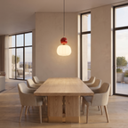 Nordic pumpkin pendant light above a dining table