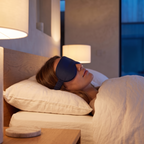 Close detail of the bamboo sleep mask sitting flush over the eyes