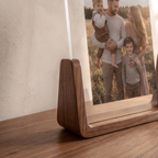 Close detail of the acrylic and wood photo frame edge and base