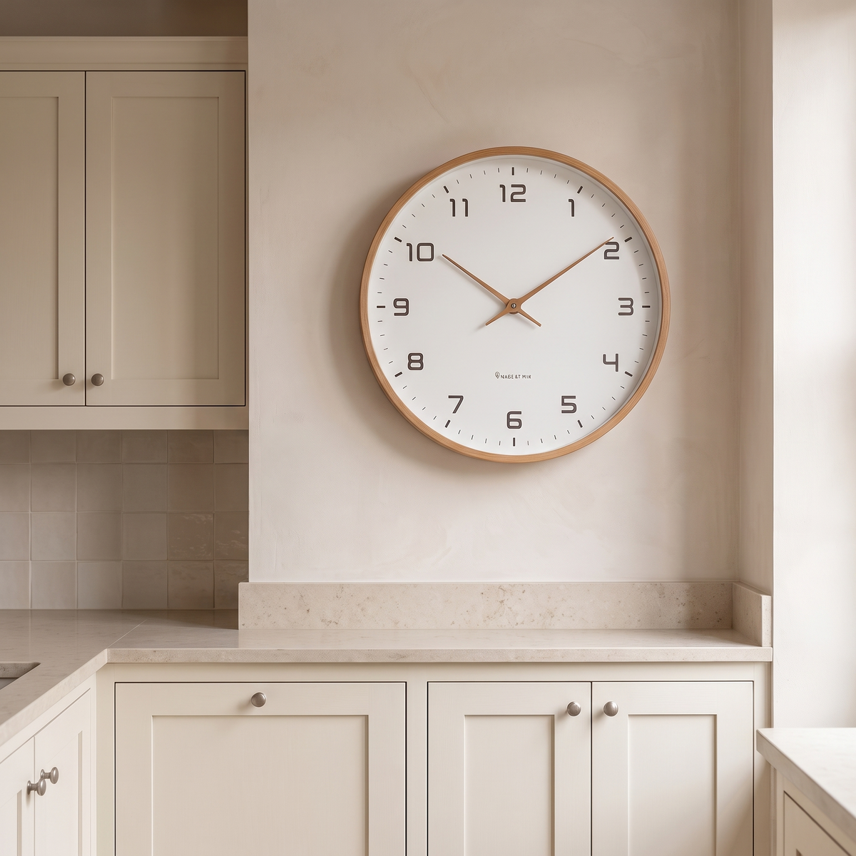 Nordic minimalist wall clock on a kitchen wall