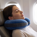 Atelierée double support travel pillow being worn with the chin supported