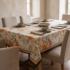 Vintage floral tablecloth on a laid dining table