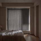 Self adhesive blackout blind fitted over a bedroom window