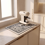 Retro coffee mat under a coffee machine on a kitchen worktop