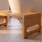 Close detail of the bamboo stool slats hinge and non slip feet