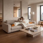 Atelierée goose plush pillow in use, hugged on a sofa