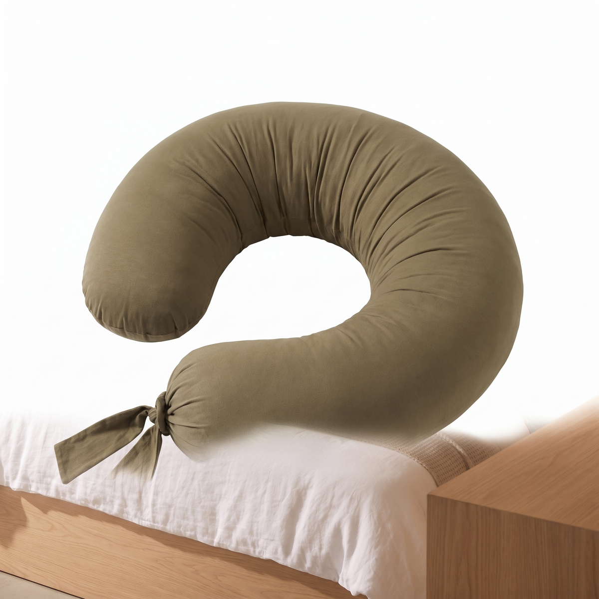 Adjustable pregnancy support pillow on a plain white background