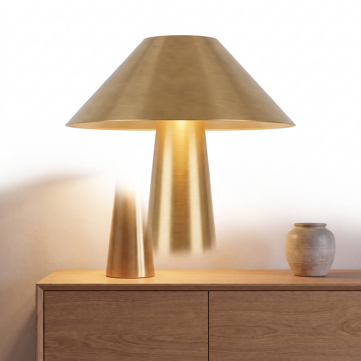Perth brushed brass table lamp on a plain white background