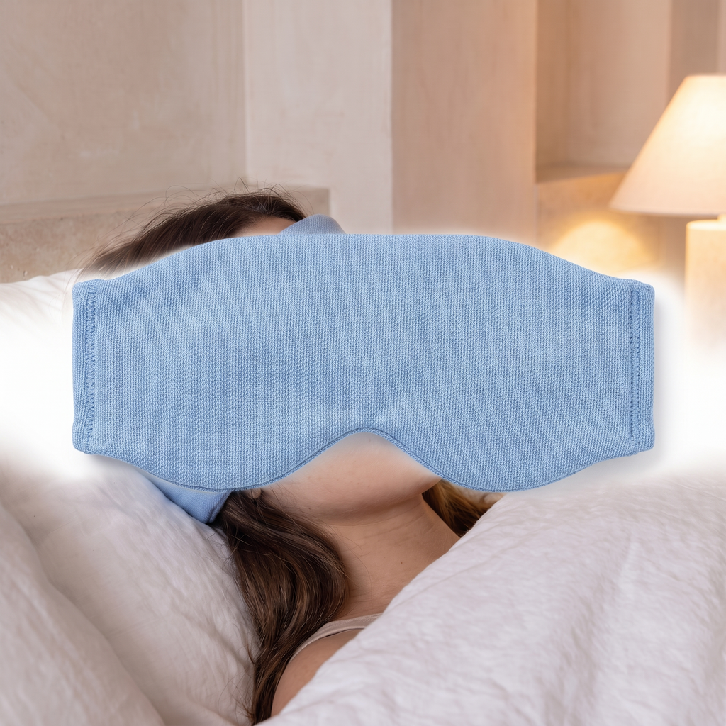 Weighted blackout sleep mask on a plain white background