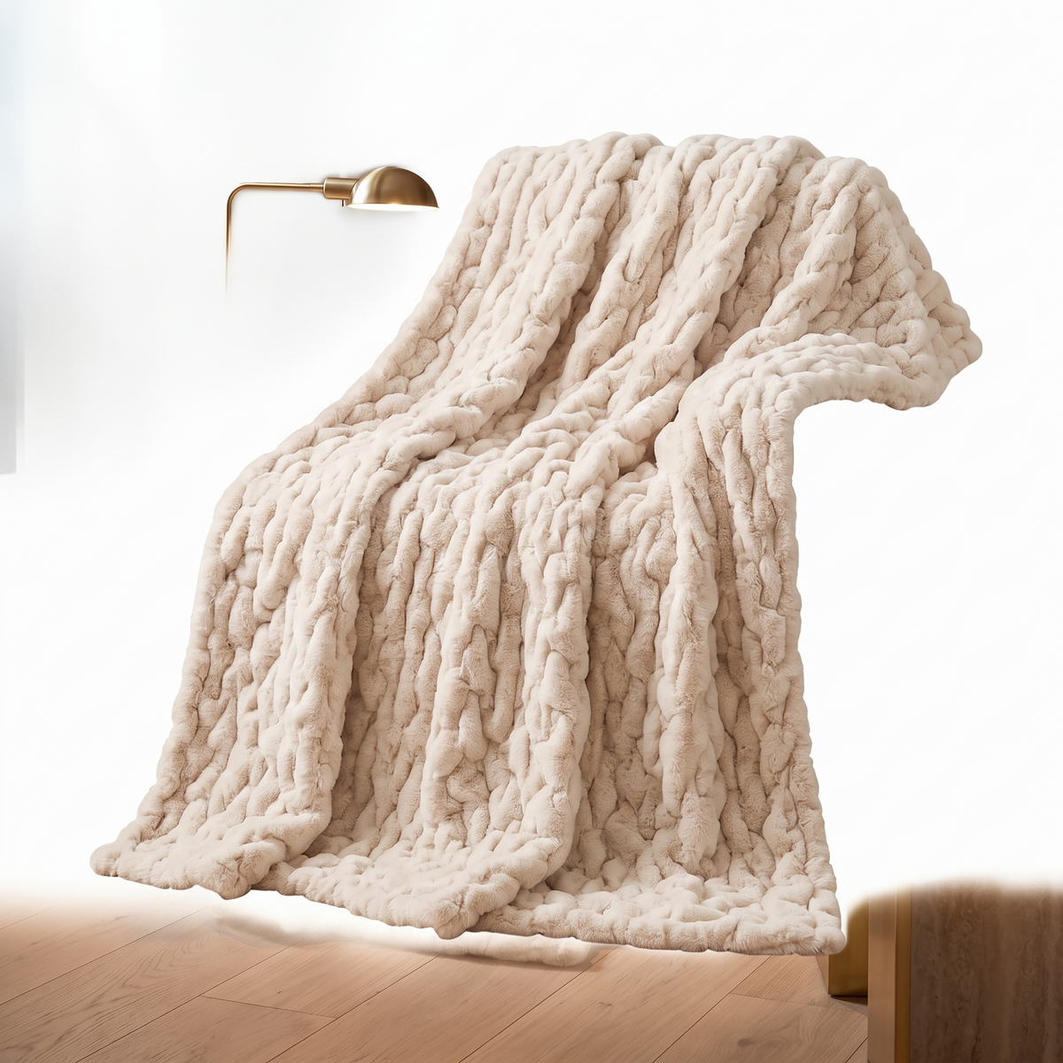 Ruched faux fur throw blanket on a plain white background