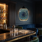 Stellaria pendant light above a dark marble bar counter in a low lit room