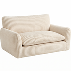 Atelieree Marlowe cream corduroy pet couch on a plain white background