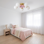 Fleurelle flush mount ceiling light fitted in a bright girls bedroom