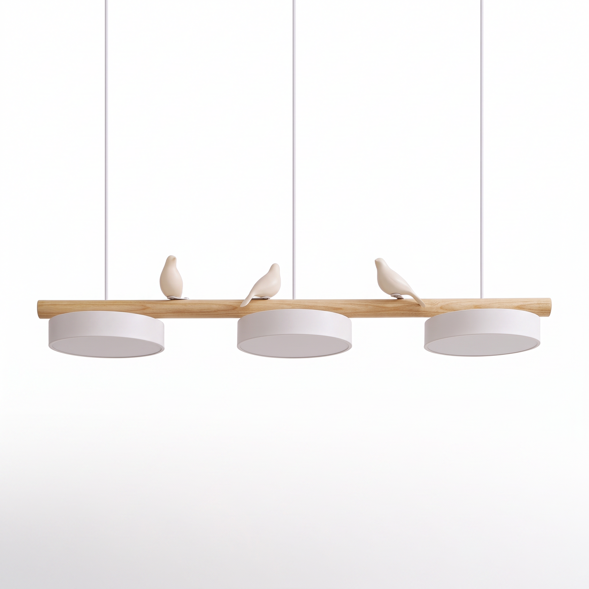 Birdsong resin bird linear pendant light with three disc shades on a white background