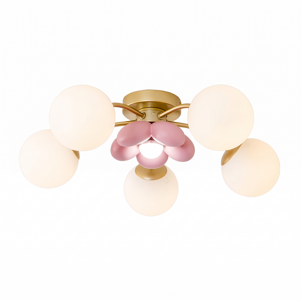 Fleurelle gold six head flush mount ceiling light with white globes and pink petal centre on a white background