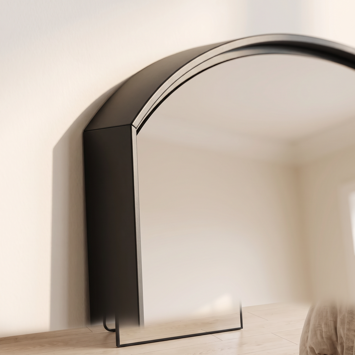 Detail of the slim black aluminium arch on the Belvedere mirror